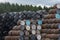 Stacked pile of old wooden barrels and casks at Speyside Cooperage in Scotland