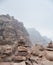 Stacked pile of stones and rocks on tranquil desert background