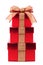 Stacked red gift boxes with rustic burlap bow and ribbon