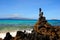 Stacked rocks on the shoreline of Little Beach on Maui, Hawaii.