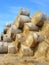 stacked rolled hay bales