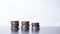 Stacked small coins on  a table