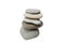 Stacked smooth grey stones. Sea pebble. Balancing pebbles isolated on white background