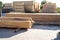 Stacked stacks of wooden planks. Lumber warehouse, wood drying