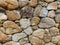 Stacked stone wall with crumbling mortar