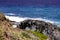 Stacked Stone Zen Statue with Ocean Coast Background