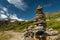 Stacked stones in Martell valley in South Tyrol on a sunny day in summer