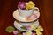 Stacked teacups with rose buds and rose petals