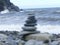 Stacked tower pebbles on a beach