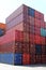 Stacked variegated shipping containers