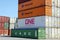 Stacked variegated shipping containers