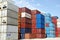 Stacked variegated shipping containers