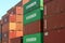 Stacked variegated shipping containers