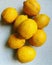 Stacked whole lemons, peel on citrus, yellow lemons piled up, sour fruit, fresh vitamins, lemon cut in half