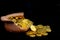 Stacking gold Coin in broken jar on black background, .Money stack for business planning investment and saving future