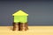 A stacking gold coins and home. Housing Loan