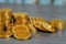 Stacking money coins on wood background,