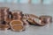 Stacking money coins on wood background, the saving with growing up