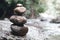 Stacking rocks on the lake or river in nature