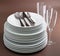 Stackof plate,cutlery and glasses