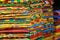 Stacks of African kente cloth on the streets of Accra