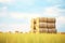 stacks of bioenergy crop hay bales