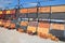 Stacks of bricks for sale. Building and construction materials, colored bricks, concrete pavers organized on pallets for sale