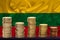 Stacks of coins of the European Union currency against the background of the flag of the country of Lithuania, financial concept,