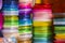 Stacks of color ribbons. Colored ribbons for decoration and gifts