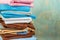 Stacks colourful bed linen textiles clothing background pile concept