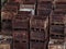 Stacks of discarded rusty metal storage boxes