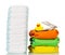 Stacks disposable and cloth diapers, money, rubber duck isolated.