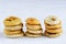 Stacks of dried figs on white backdrop