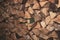 Stacks of firewood. preparation of firewood for the winter. firewood pile