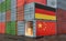 Stacks of Freight containers. German and China flag.
