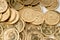 Stacks of gold coins of Pakistani currency symbolize wealth and prosperity