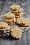 Stacks of homemade honey biscuits with cracks added with coconut