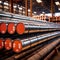 Stacks of metal pipes, construction components for industry, in storage in warehouse