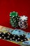 Stacks of poker chips with money on red background, Romanian LEI currency