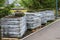 stacks of sod rolls for new lawn for landscaping. Lawn grass in rolls on pallets. rolled grass lawn is ready for laying