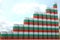 Stacks of steel drums with flag of Bulgaria form increasing chart or upwards trend. Petroleum industry success concept