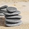 Stacks of stones on the sand of a beach