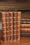 Stacks of various antique books