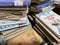 Stacks of worn-out books for sale at a used book fair in Vietnam, May 2022