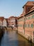 Stade, Germany - August 25, 2019: View at Schwinge River and historical Museum at the right