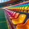 Stadium grandstand adorned with colorful rows of plastic seating