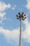 Stadium halogen Spot-light tower with blue sky and cloud backgr