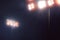 Stadium lights in sport game in dark night sky