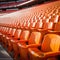 Stadium solitude Rows of empty orange seats in soccer arena