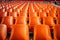 Stadium solitude Rows of empty orange seats in soccer arena